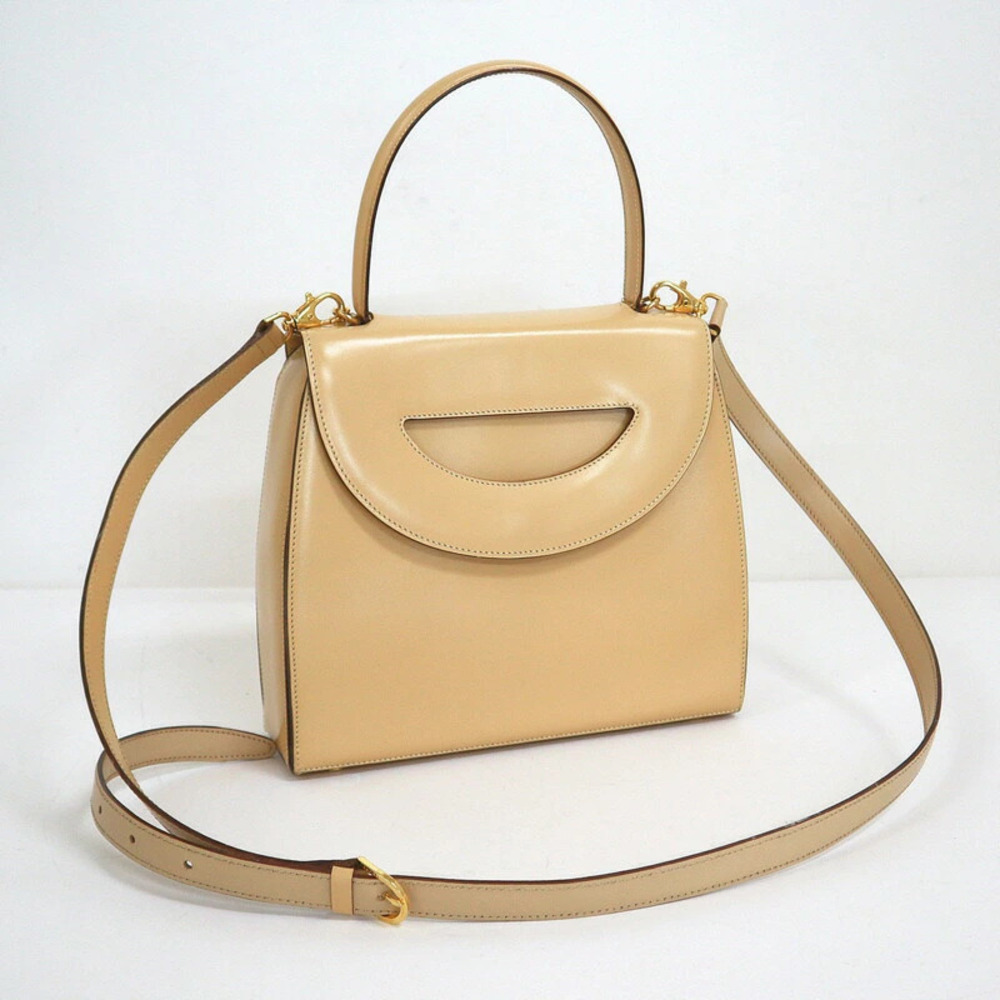 Celine beige Tan leather handbag silhouette top handle cutout flap
